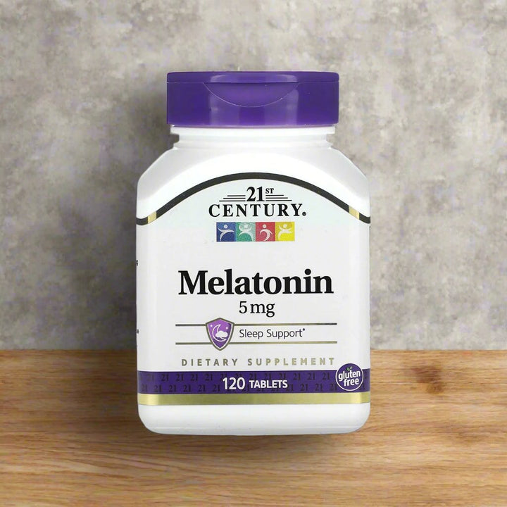 21st century melatonin 5mg is placing on top of kitchen table