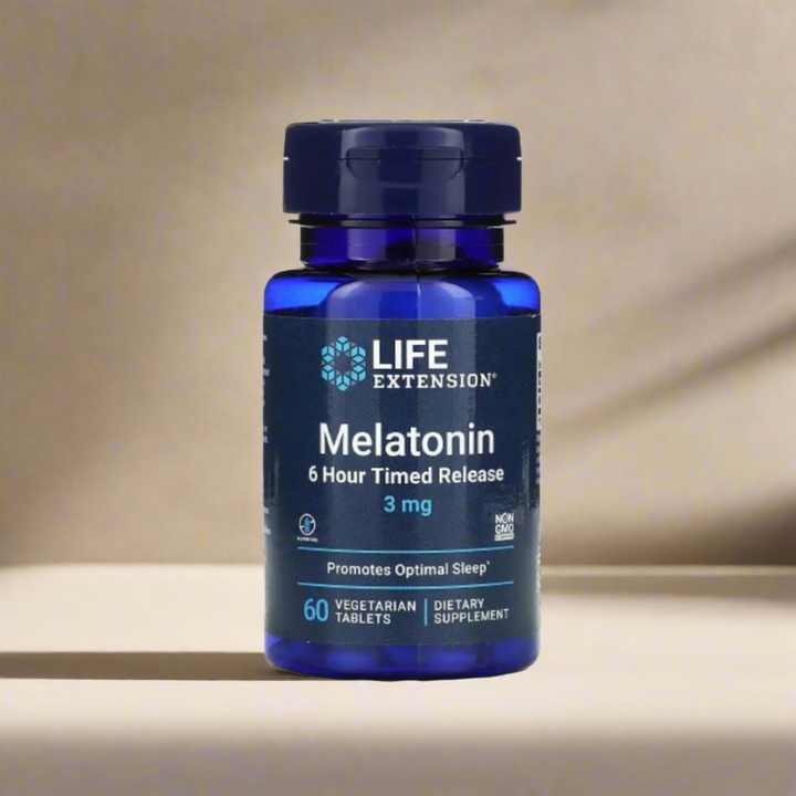 Blue bottle of Life Extension Melatonin on a gray background