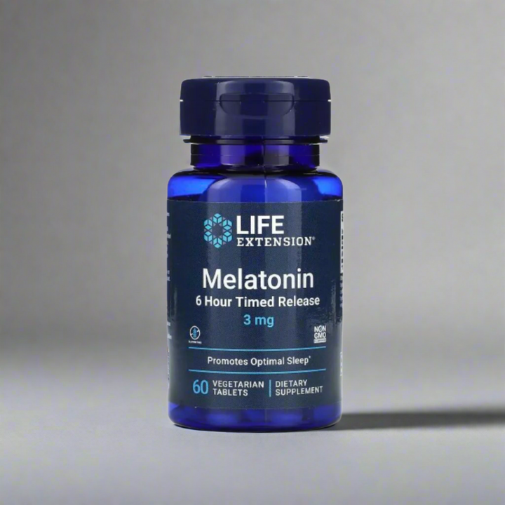 Blue bottle of Life Extension Melatonin supplement on a white background
