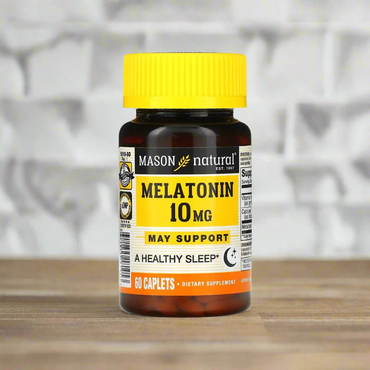 Mason Natural Melatonin 10mg is placing on top of kitchen table