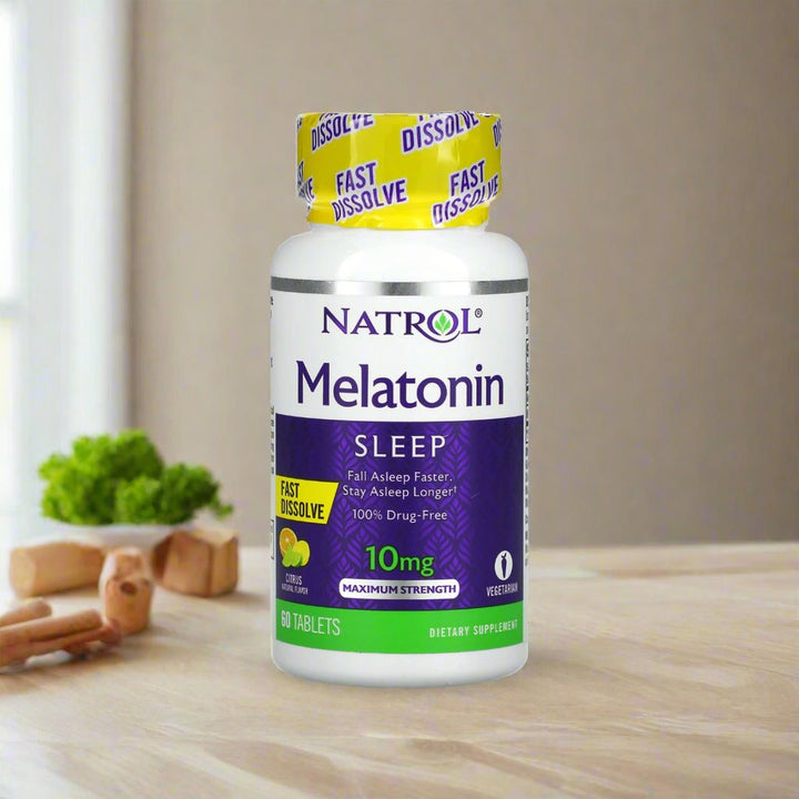 Natrol melatonin fast dissolve 10mg 60tablets, citrus flavour is placing on table.