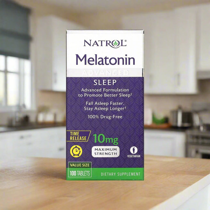 Natrol melatonin time release 10mg 100 tablets is placing on top of kitchen table