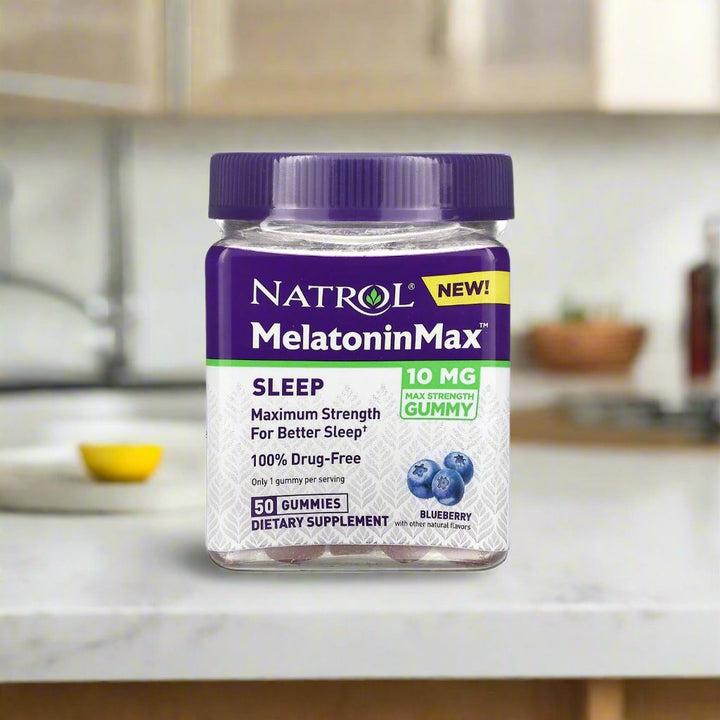 natrol melatoninmax sleep gummy is placing on top of kitchen table